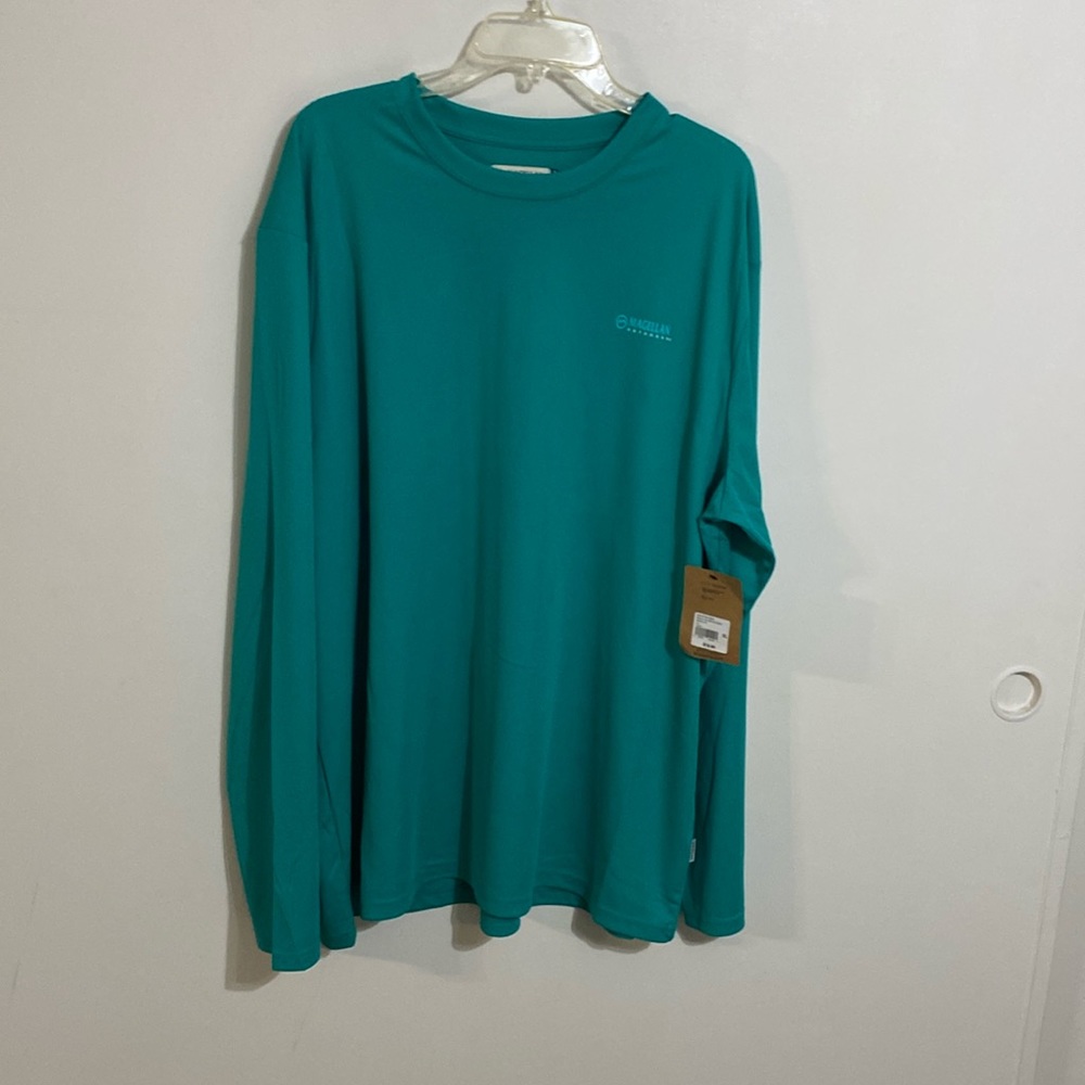 Magellan Men’s XL turquoise fishing shirt. Brand new, never worn.